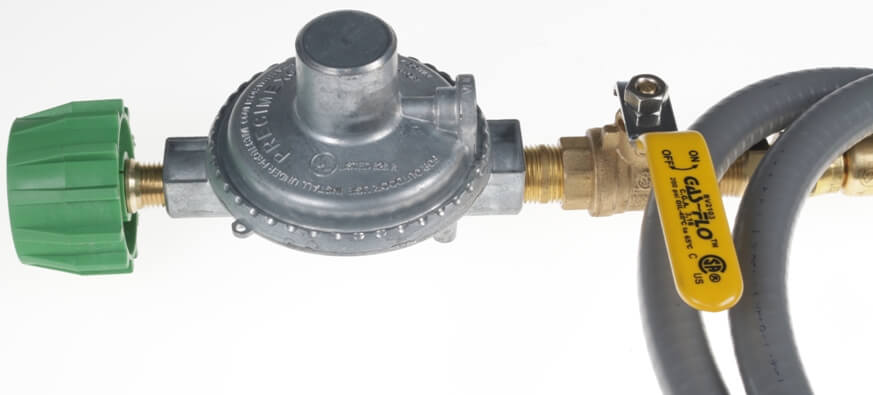 Green Acme Safety Tank Fitting on Low Pressure Regulator